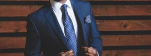 Uso indevido do termo “advocacia predatória” gera condenação por danos morais 1 | Juristas man wearing blue suit